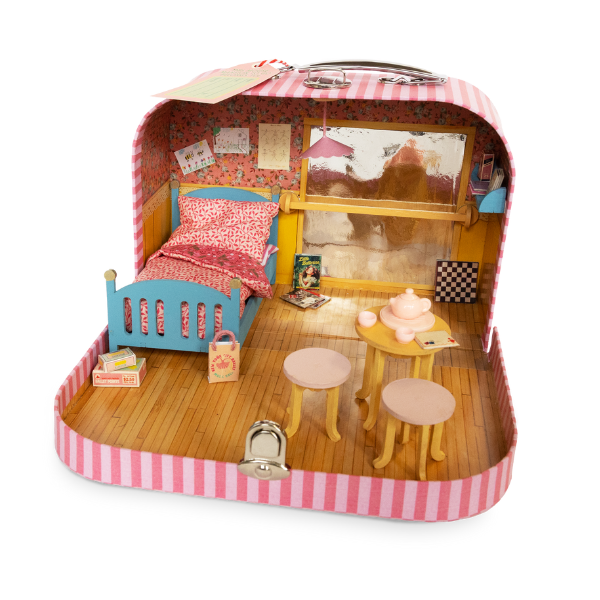 Dollhouse with furniture inside a pink and white checkered case