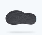 Black sole of a shoe on a white background