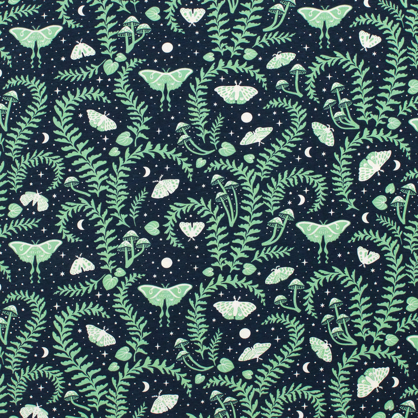 Pattern of green plants and white butterflies on a dark blue background