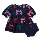 Navy blue dress with colorful bow patterns and matching bloomers on a transparent background