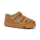 A single tan leather toddler sandal with cutout straps and hook-and-loop closures, shown from a side angle on a white background.