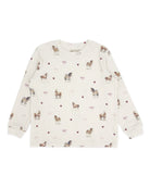 An off-white long-sleeve children's top with an all-over print of horses, ponies, and small pink hearts, shown flat against a white background.