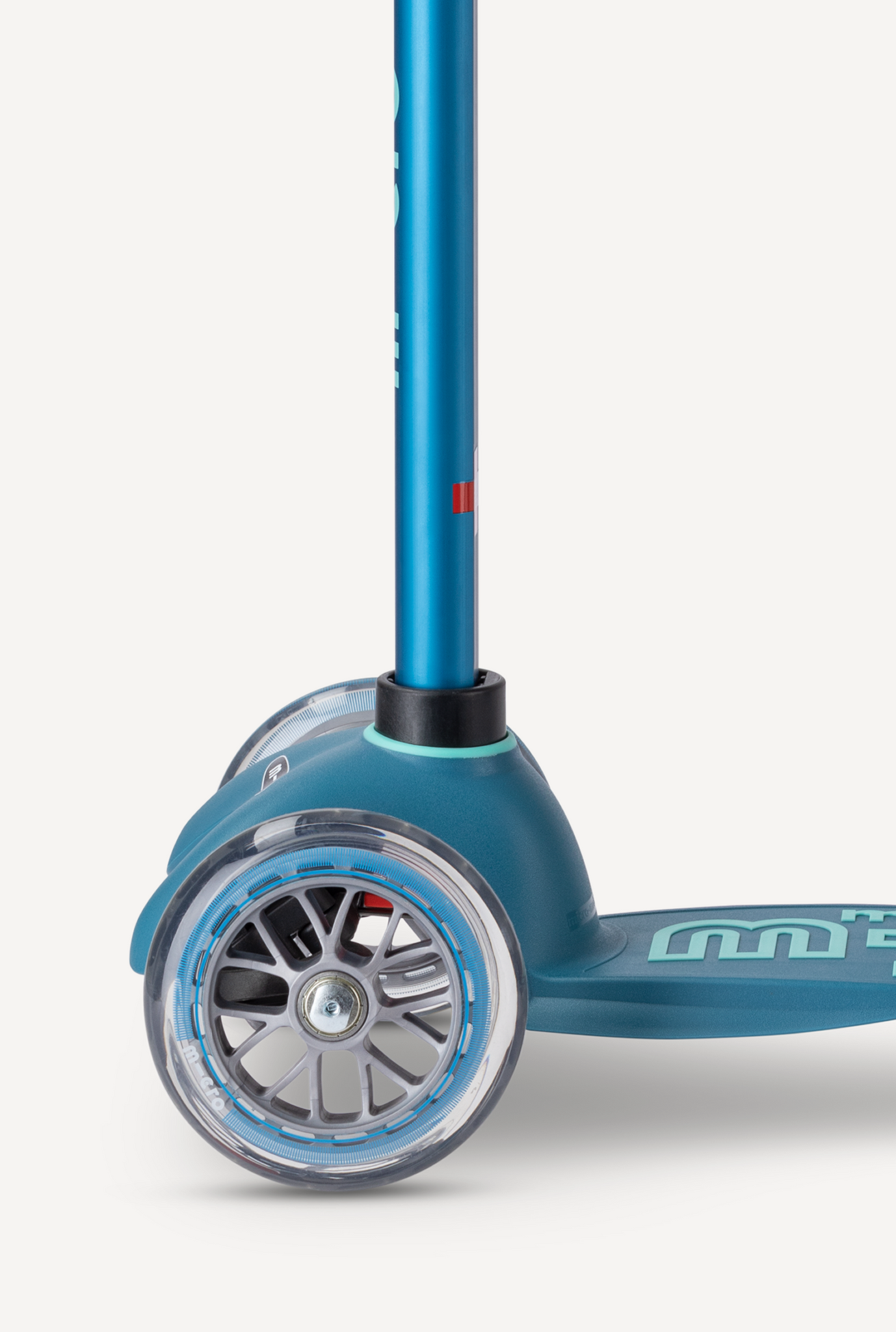 Blue scooter with transparent wheel on a white background