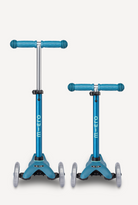 Two blue micro scooters on a white background