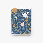 Greeting card with floral design and dove on a blue background, featuring text 'Blessings on Your Baptism'.