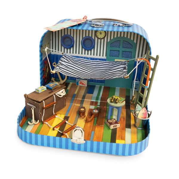 Toy boat with detailed interior and striped exterior on a white background