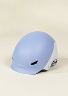 Light blue helmet on a beige background