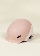 Pink helmet on a beige background