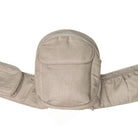 Beige baby carrier with a strap on a white background