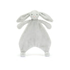 Gray plush bunny toy on a white background