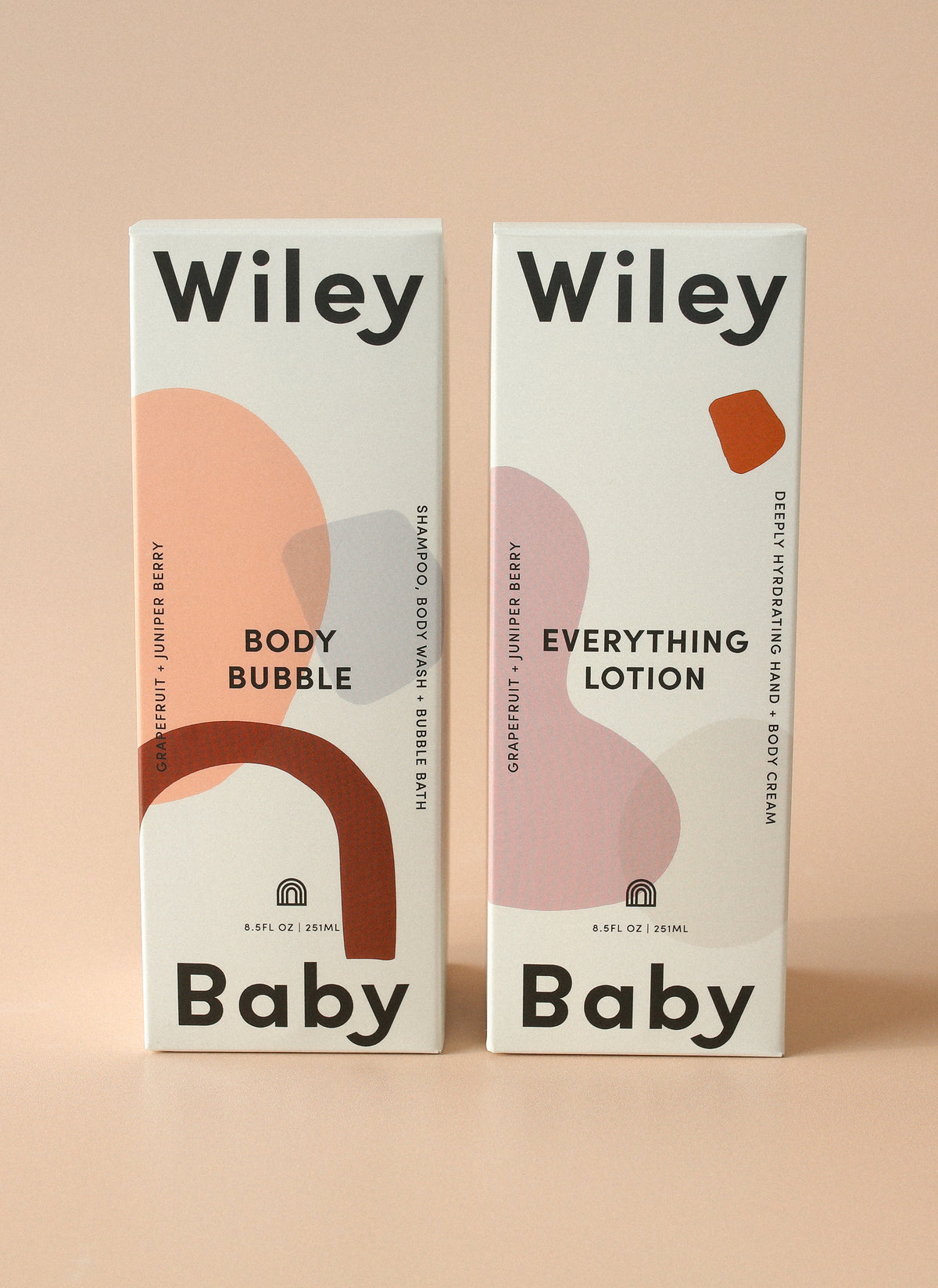 Two 'Wiley Baby' product boxes on a beige background