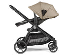 Black and beige stroller on a white background