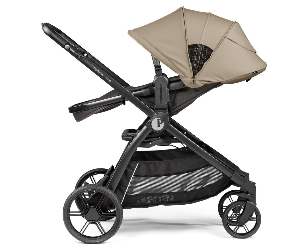 Black and beige stroller on a white background