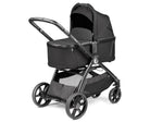 Black stroller with canopy on a white background