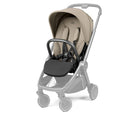 A Yupoong stroller and car seat combo in beige and dark gray, shown on a clean white background with the stroller frame rendered in a semi-transparent light gray overlay.