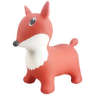 Red and white fox figurine on a white background