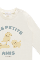 Baby outfit with dog illustrations and text on a white background