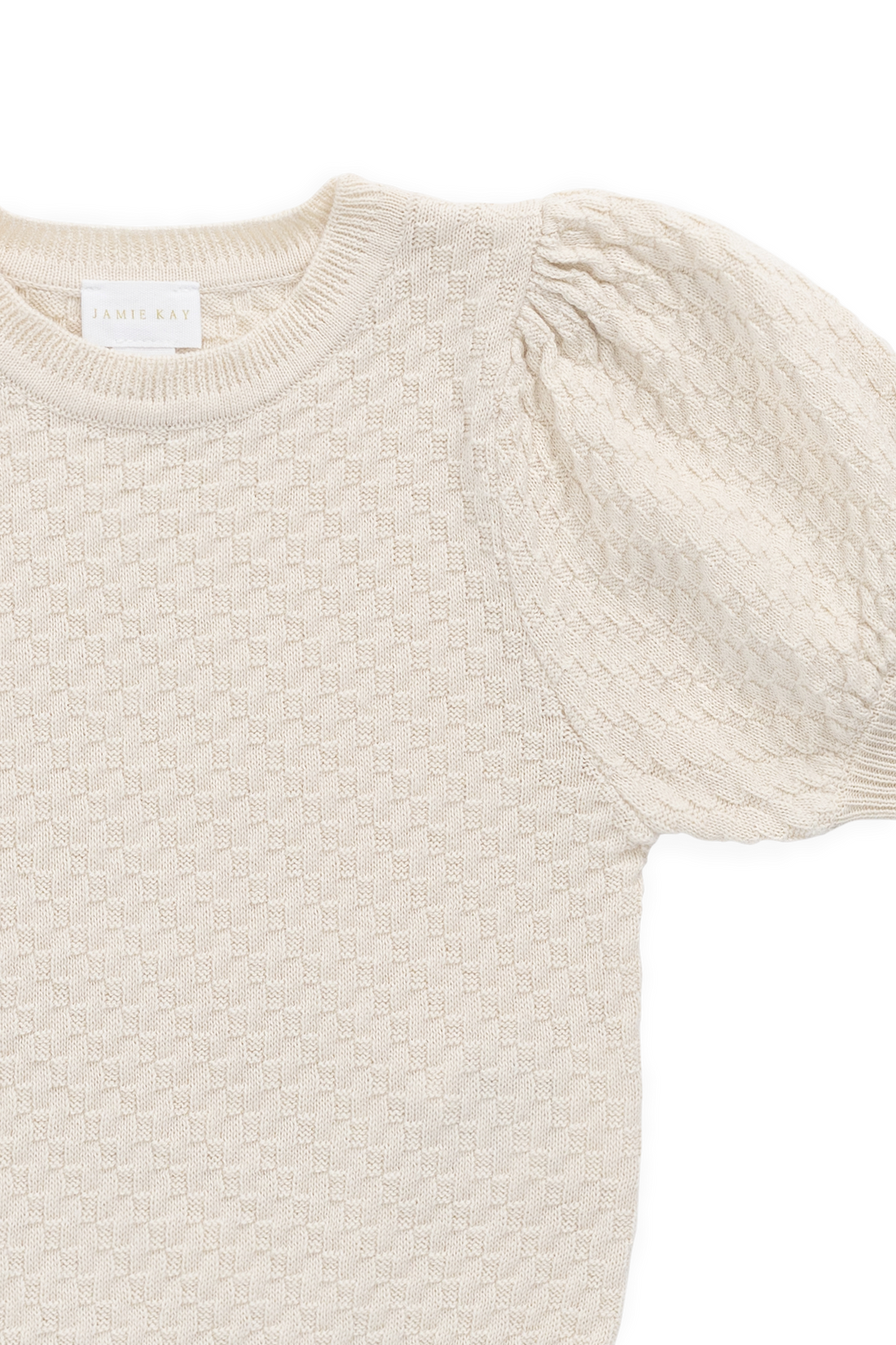 Beige sweater with puff sleeves on a white background