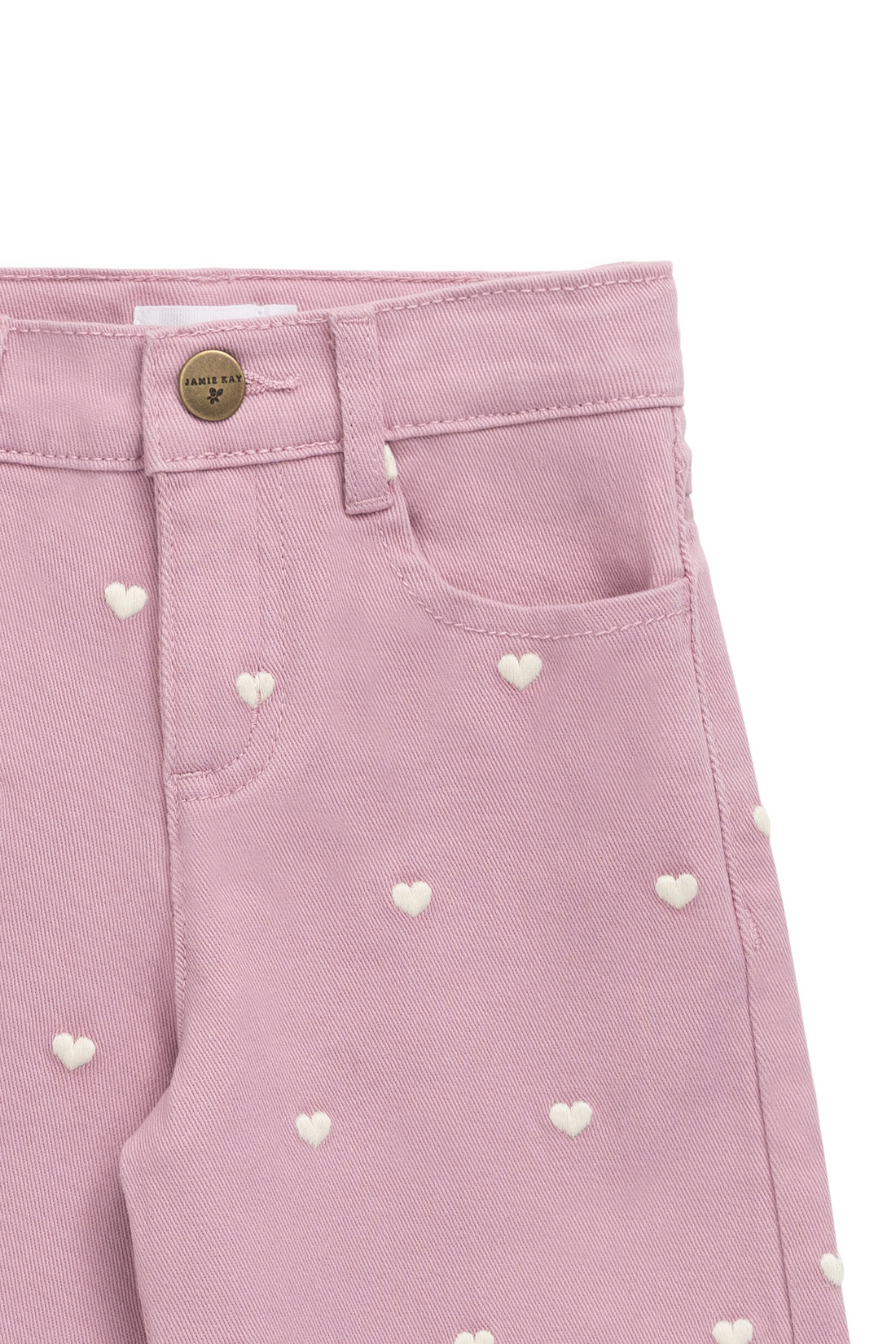 Pink pants with heart patterns on a white background