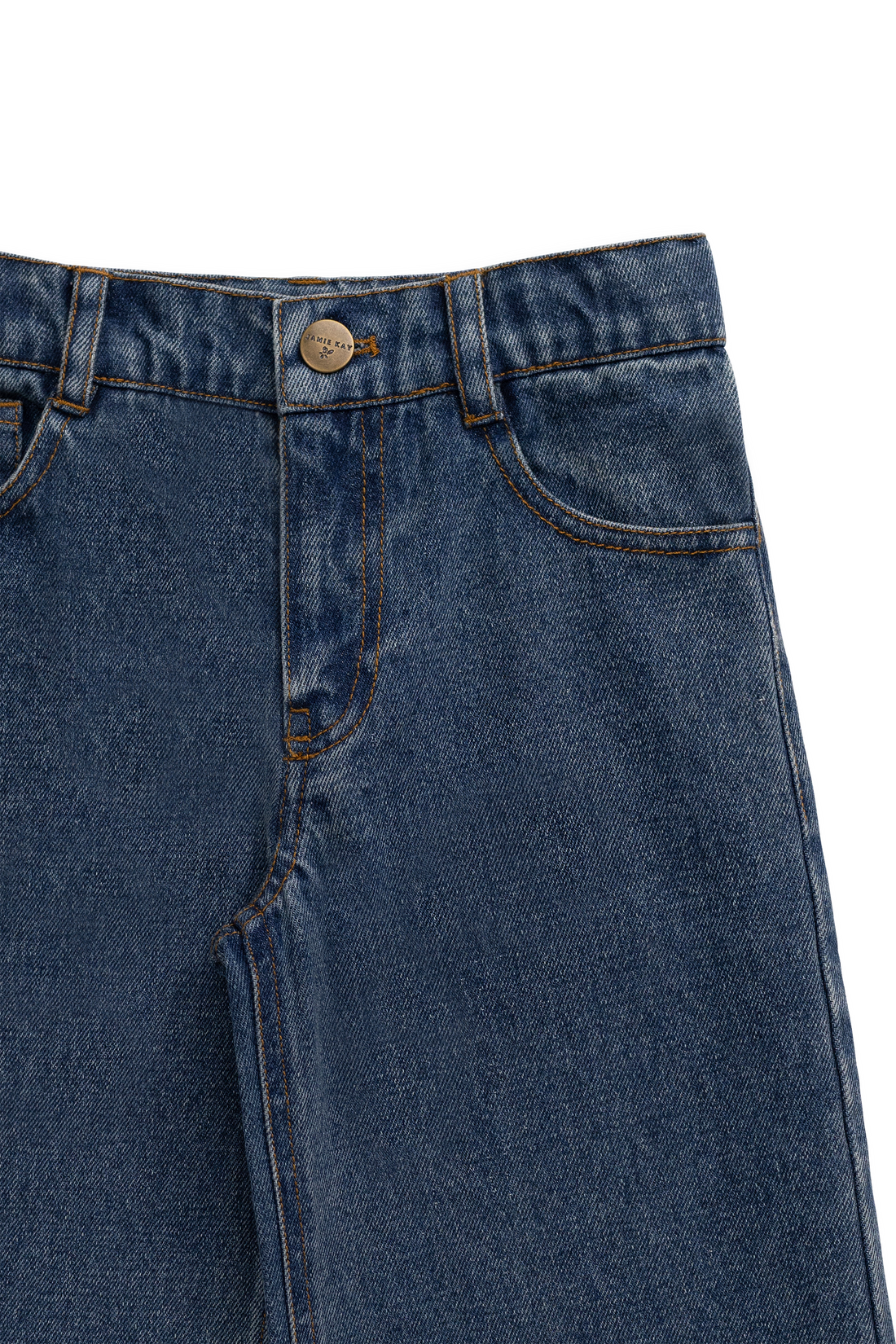 Close-up of dark blue denim jeans showing the waistband, belt loops, button, front pockets, and seam details against a plain white background.