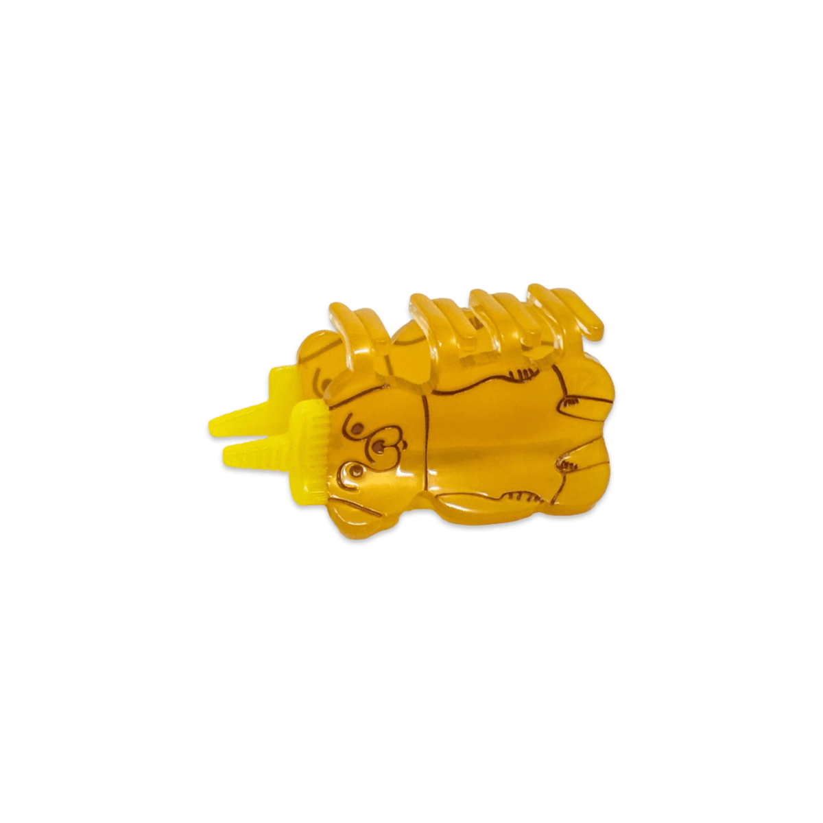 Yellow plastic object with a textured surface on a white background