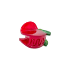 Red apple-shaped hair clip on a white background