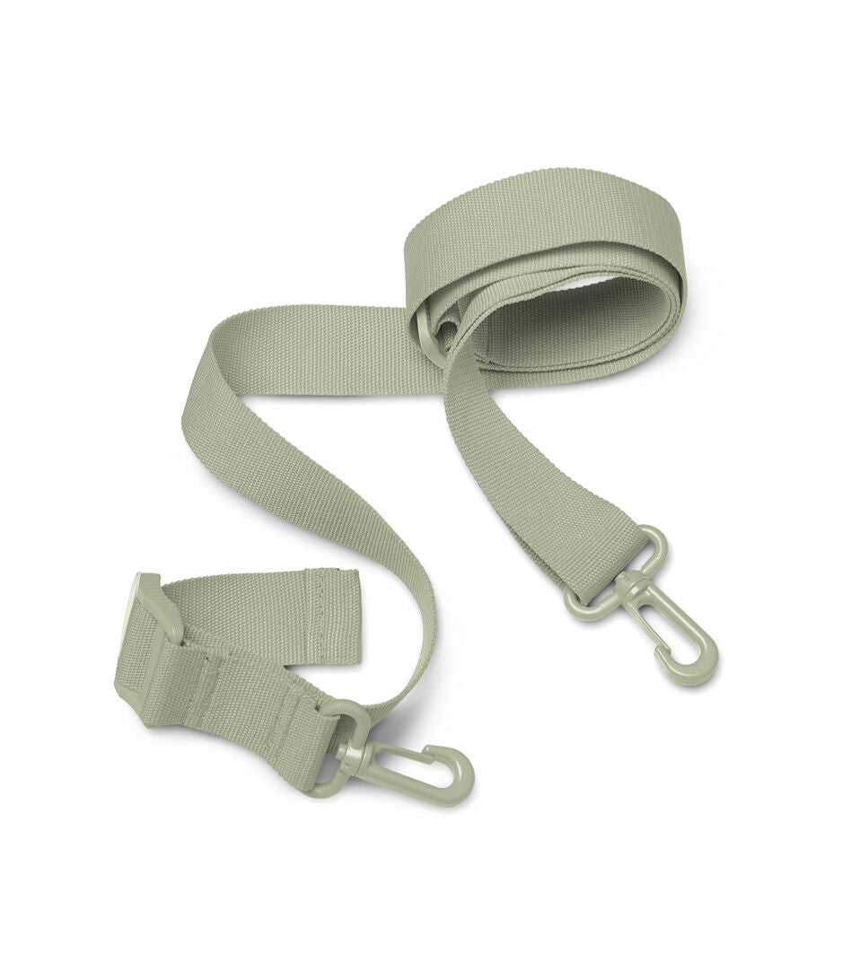 Green strap with buckles on a white background