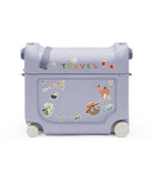 Children's suitcase with travel-themed stickers on a white background