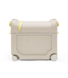 Beige suitcase with yellow accents on a white background