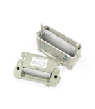 Two rolls of paper in a protective container on a white background