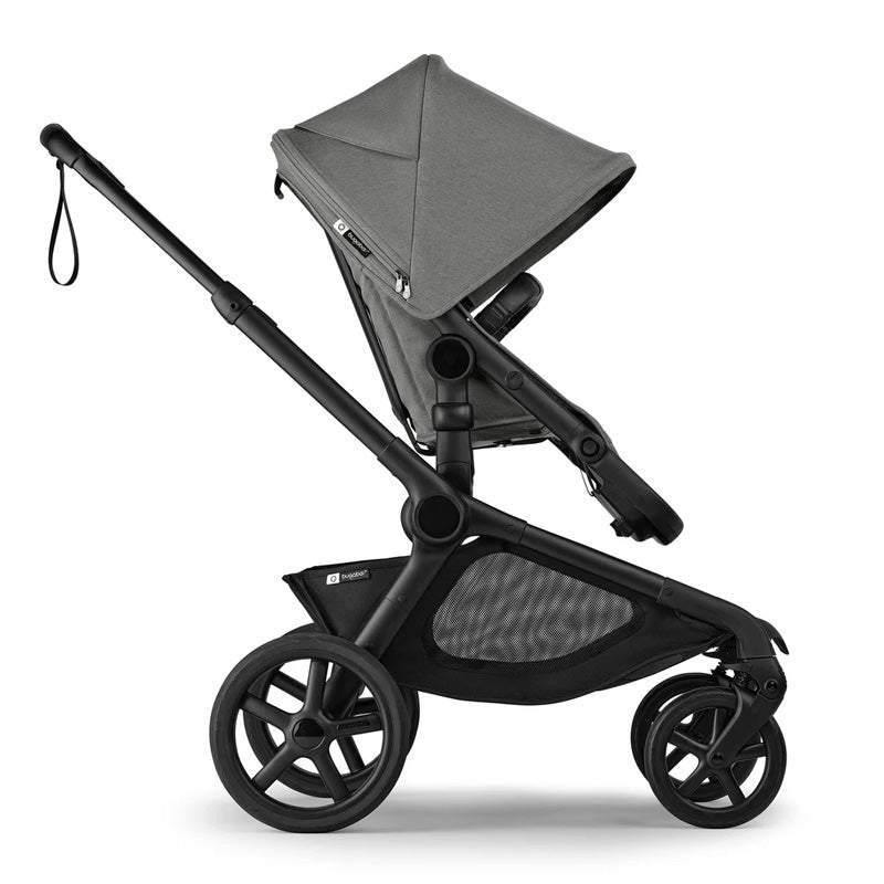 Black and gray stroller on a white background