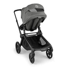 Gray and black stroller on a white background