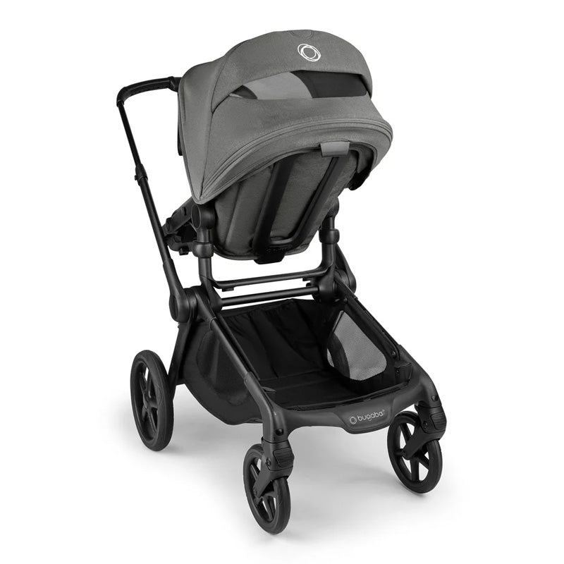 Gray and black stroller on a white background