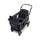 Black stroller with 'Wombefold' branding on a white background