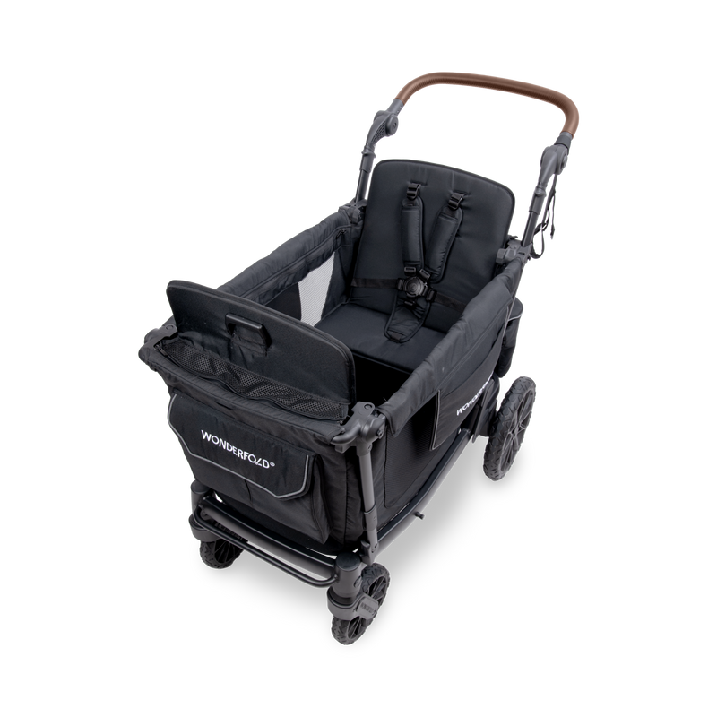 Black stroller with 'Wombefold' branding on a white background