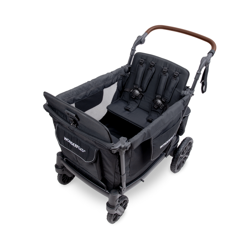 Black stroller with adjustable seat and wheels on a white background
