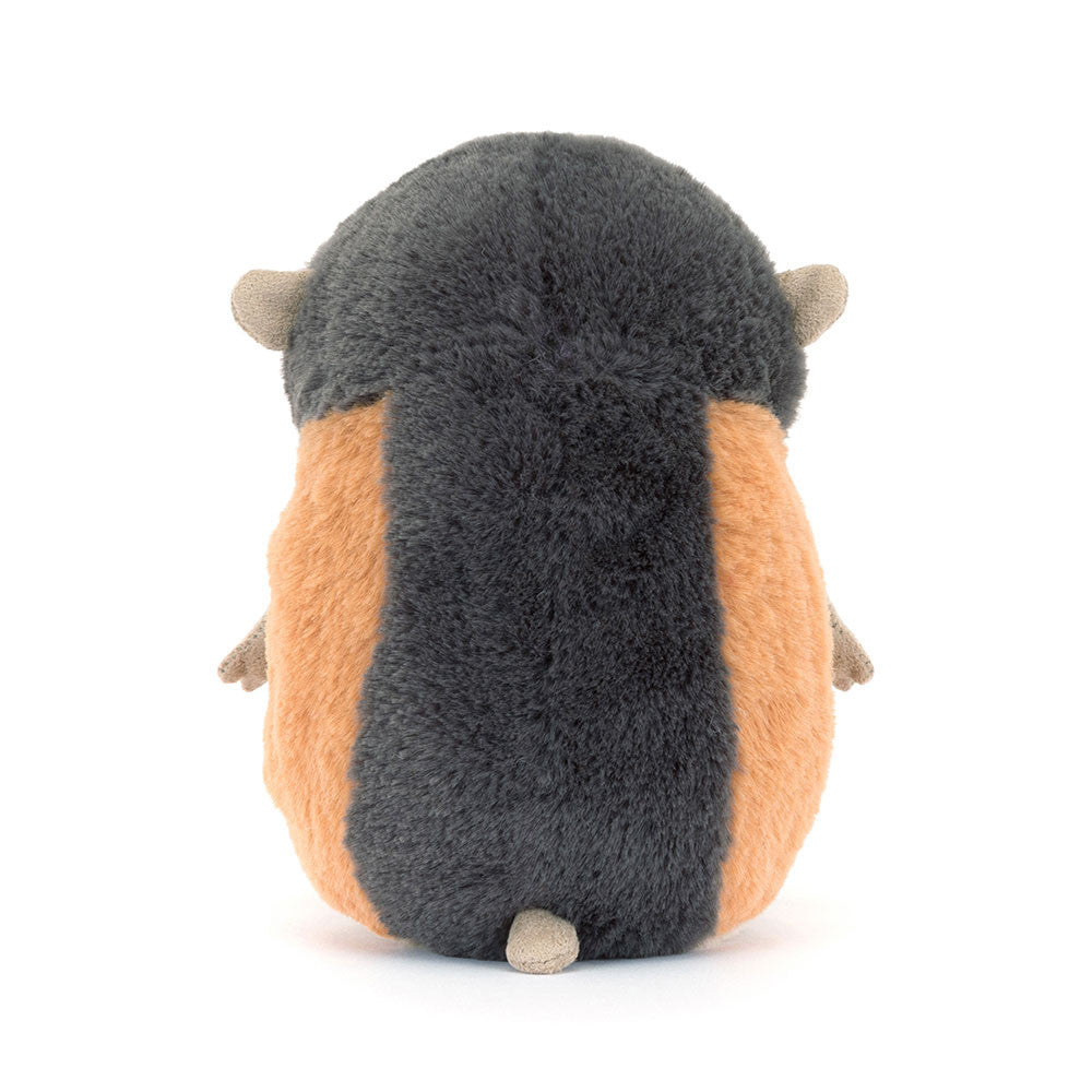 Plush toy resembling a small creature with a dark gray top and orange bottom on a white background