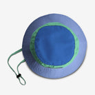 Blue and green sun hat on a light gray background