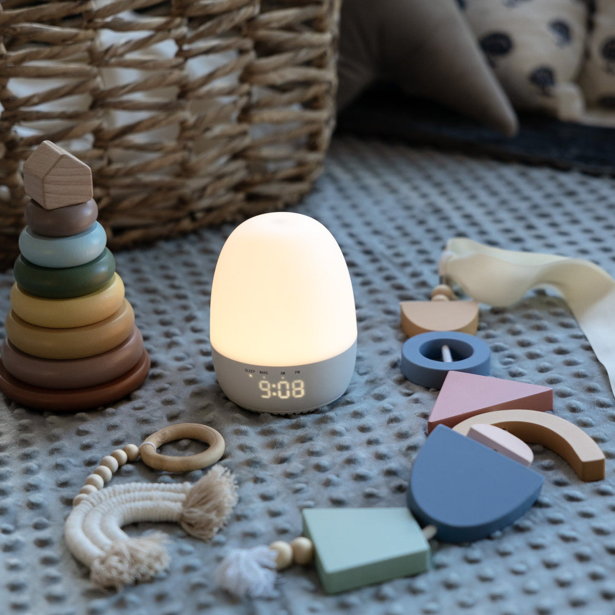 Children's night light with toys on a textured surface