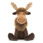 A plush moose toy with large tan antlers, a light brown snout and face, and dark brown fur, sitting against a plain white background.