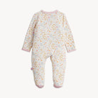 Baby onesie with floral pattern on a white background