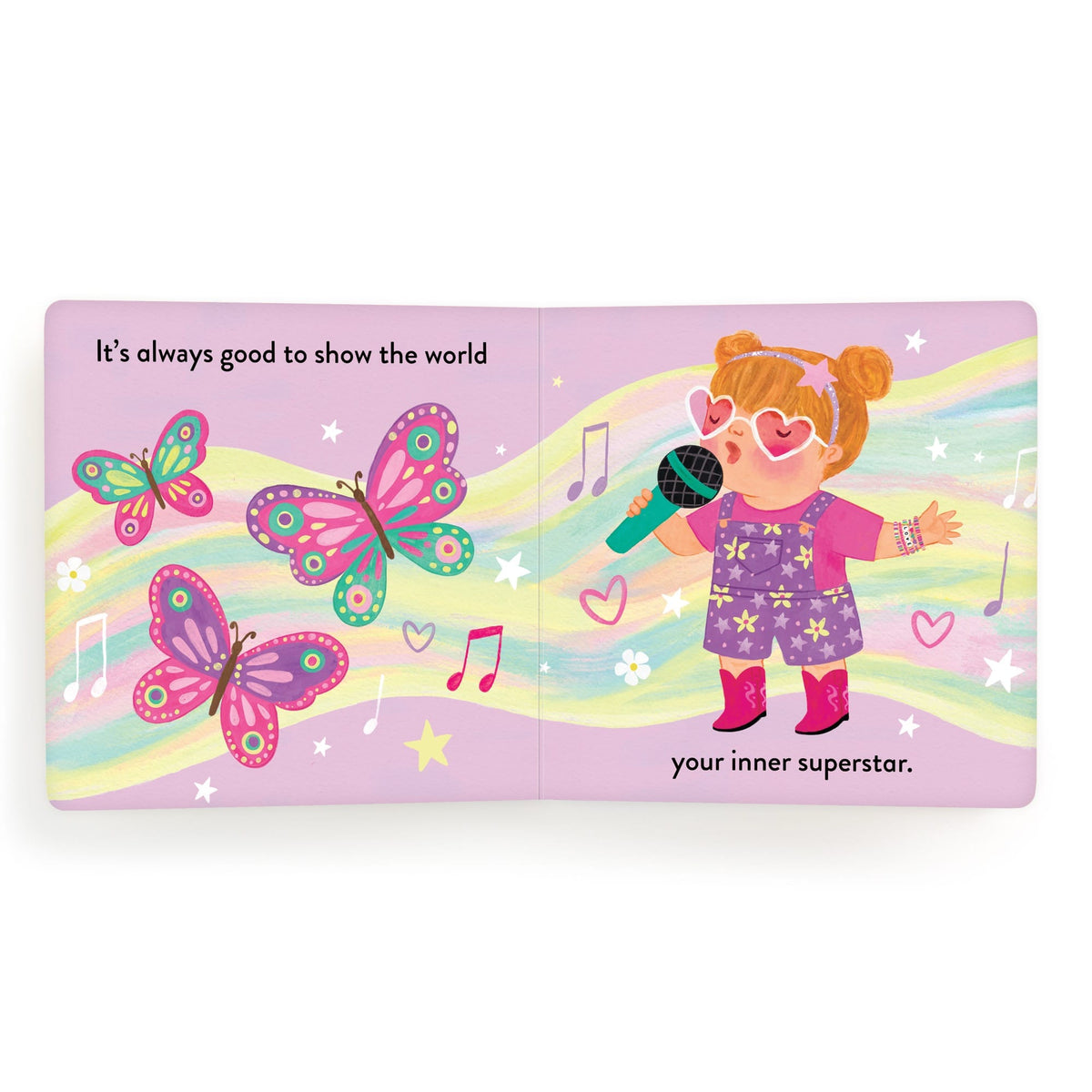Children's book page with a colorful illustration of a girl holding a microphone and butterflies on a pink background.