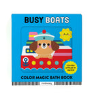 Color Magic Bath Book - Busy Boats featuring a friendly dog captain on a red and white boat against a bright blue background with a smiling sun and the text "COLORS APPEAR IN WATER!".