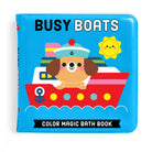 Color Magic Bath Book - Busy Boats featuring a friendly dog captain on a red and white boat against a bright blue background with a smiling sun and the title "BUSY BOATS" and banner reading "COLOR MAGIC BATH BOOK".