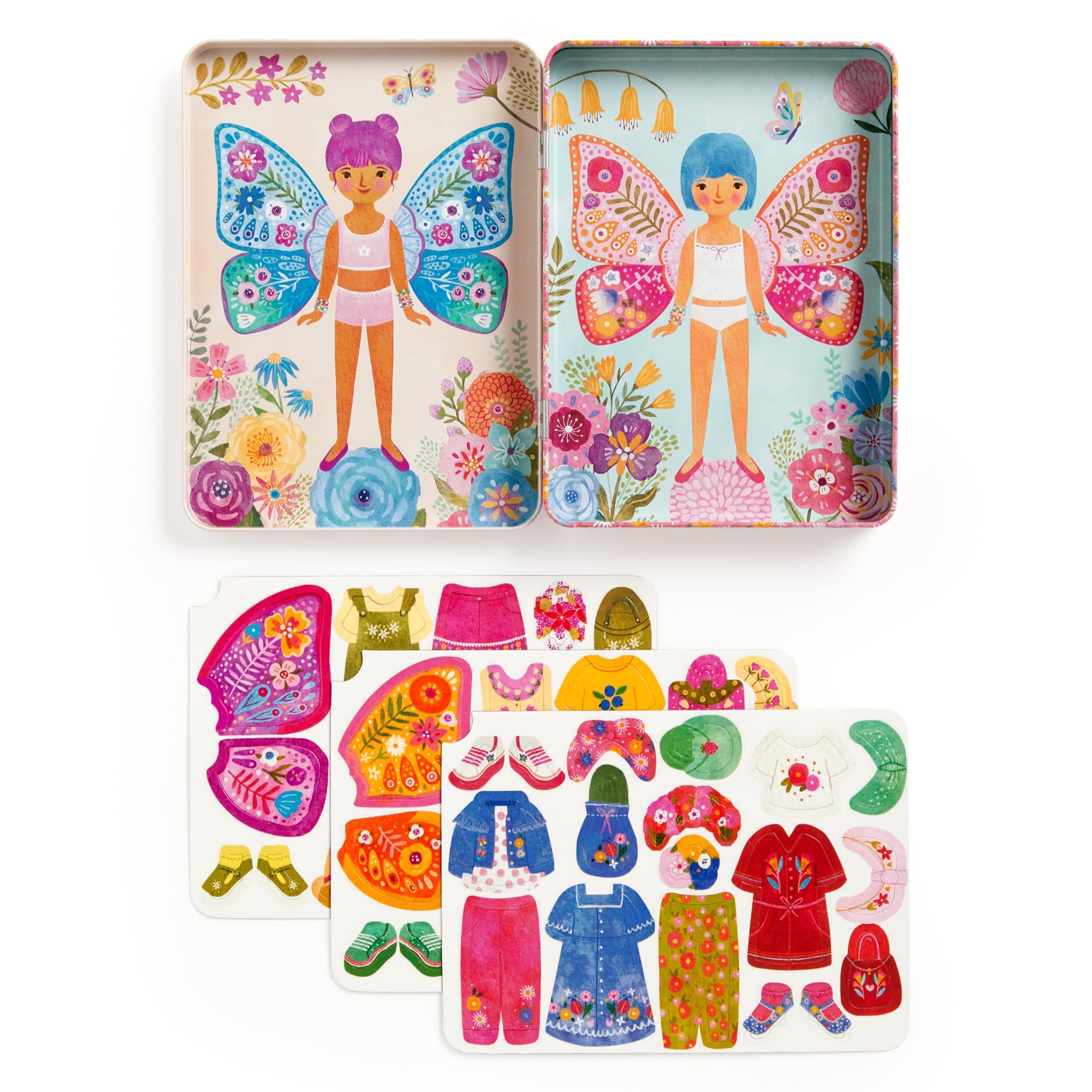 Colorful toy set with fairy-themed tin, figurine, and dress-up clothes on a white background