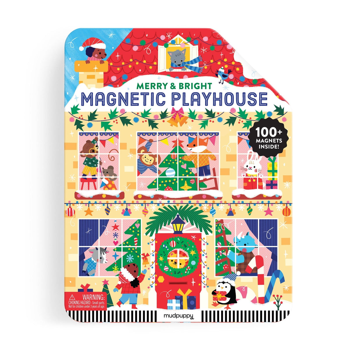 An open interior view of the Merry & Bright Magnetic Playhouse by Mudpuppy tin set, displaying a colorful holiday room scene with a fireplace, Christmas tree, and decorated windows ready for arranging the included magnetic play pieces.