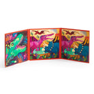 Dinosaurs Roar! Magnetic Puzzle Set open flat to display two completed 20-piece dinosaur puzzle scenes inside a red trifold case.