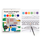 Frank Lloyd Wright painting kit with coloring book and paintbrush on a white background