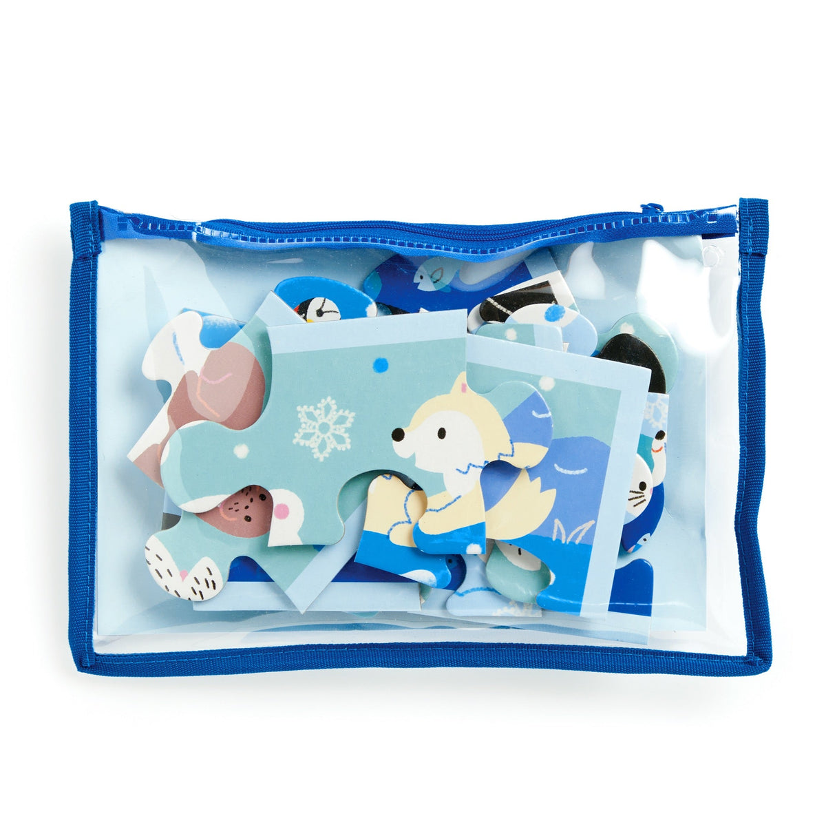 A zippered blue clear-front pouch containing loose puzzle pieces of the Mudpuppy Arctic Friends 12-piece puzzle, revealing a partial view of arctic animals on the pieces.