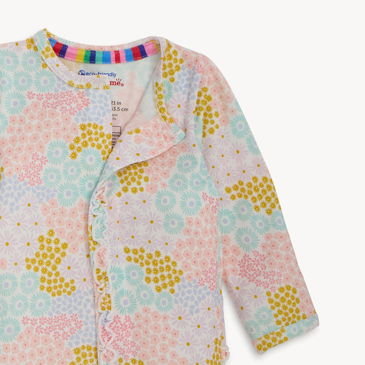 Floral patterned baby cardigan with colorful trim on a white background